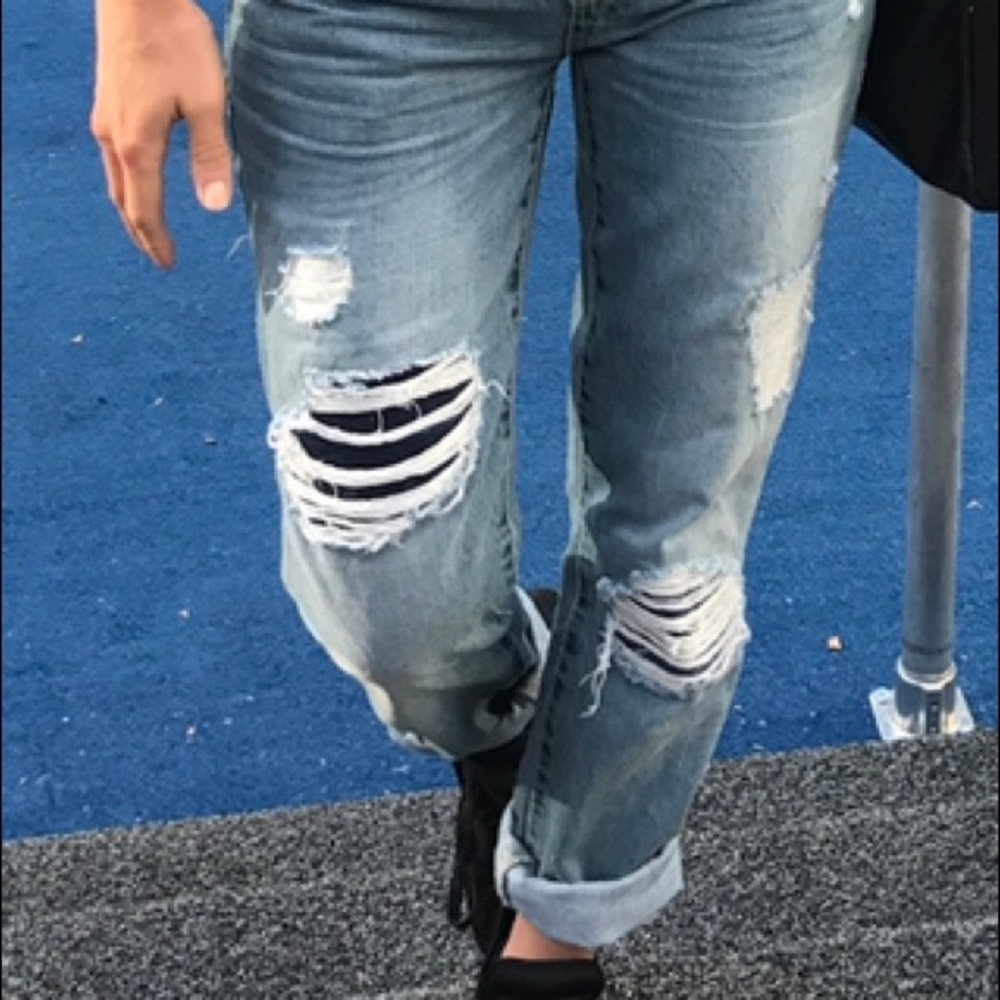 Blue distressed patches jeans